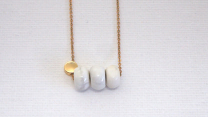 Howlite rondelle gemstone gold necklace